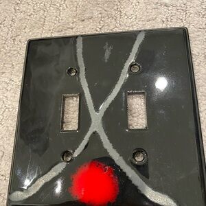 Asian inspired double light switch cover. Gently used.